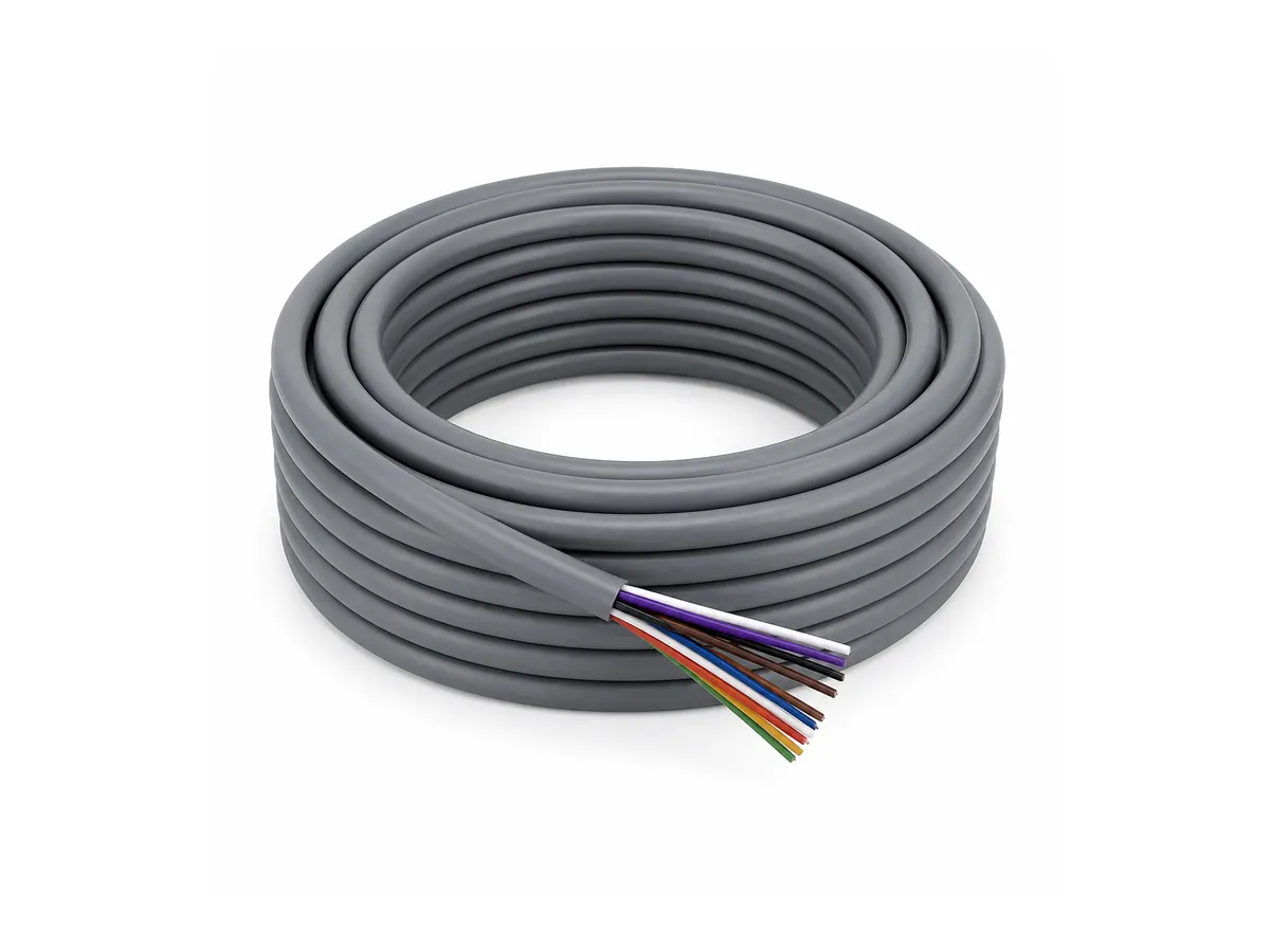 Coiled ultra high flex drag chain control cable on white background